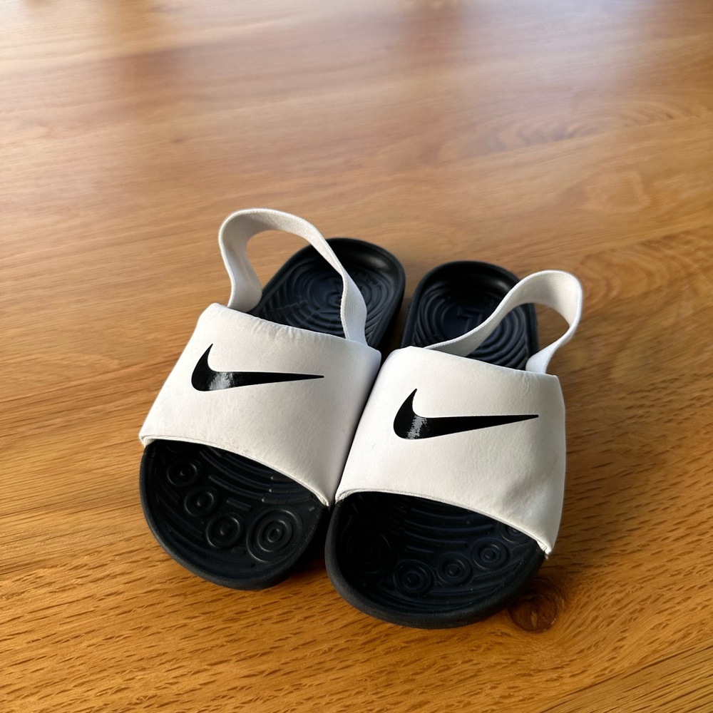 Nike White and Black Sandals Sleek Design